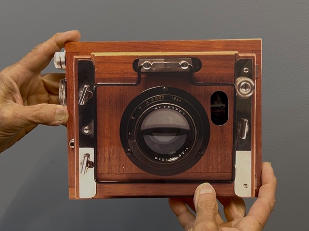 Custom dimensional vintage camera prop with hidden cell phone compartment for photographic sessions at the Biltmore
