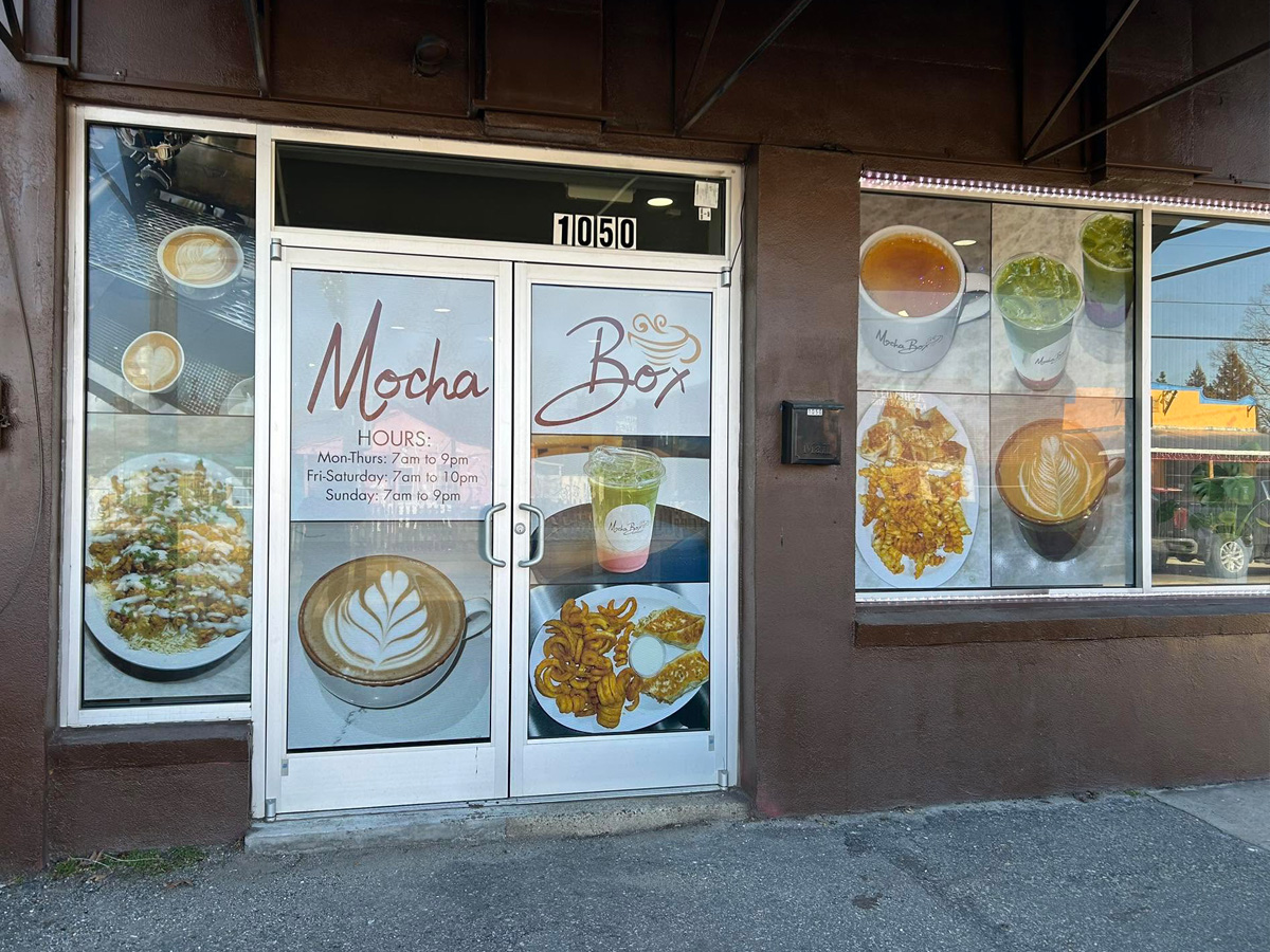 Mocha Box coffee shop storefront with full-color food and beverage window graphics across windows and glass doors